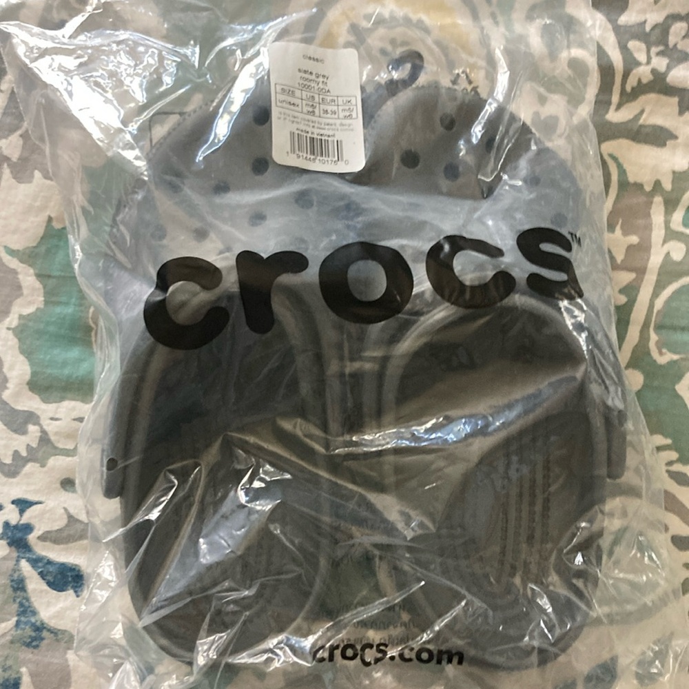 Crocs size m6/w8. New in bag . Slate grey